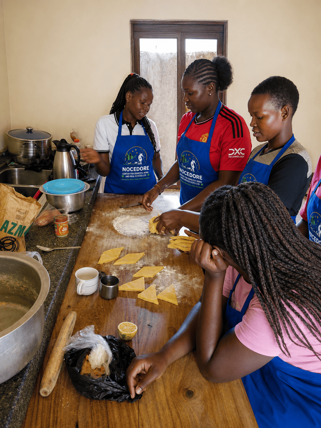 NOCEDORE trainees learning professional domestic work skills